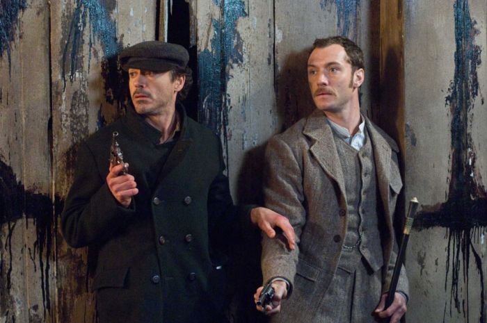 ROBERT DOWNEY JR. as Sherlock Holmes and JUDE LAW as Dr. Watson in Warner Bros. Pictures' and Village Roadshow Pictures' action/adventure mystery "Sherlock Holmes," distributed by Warner Bros. Pictures. PHOTOGRAPHS TO BE USED SOLELY FOR ADVERTISING, PROMOTION, PUBLICITY OR REVIEWS OF THIS SPECIFIC MOTION PICTURE AND TO REMAIN THE PROPERTY OF THE STUDIO. NOT FOR SALE OR REDISTRIBUTION.